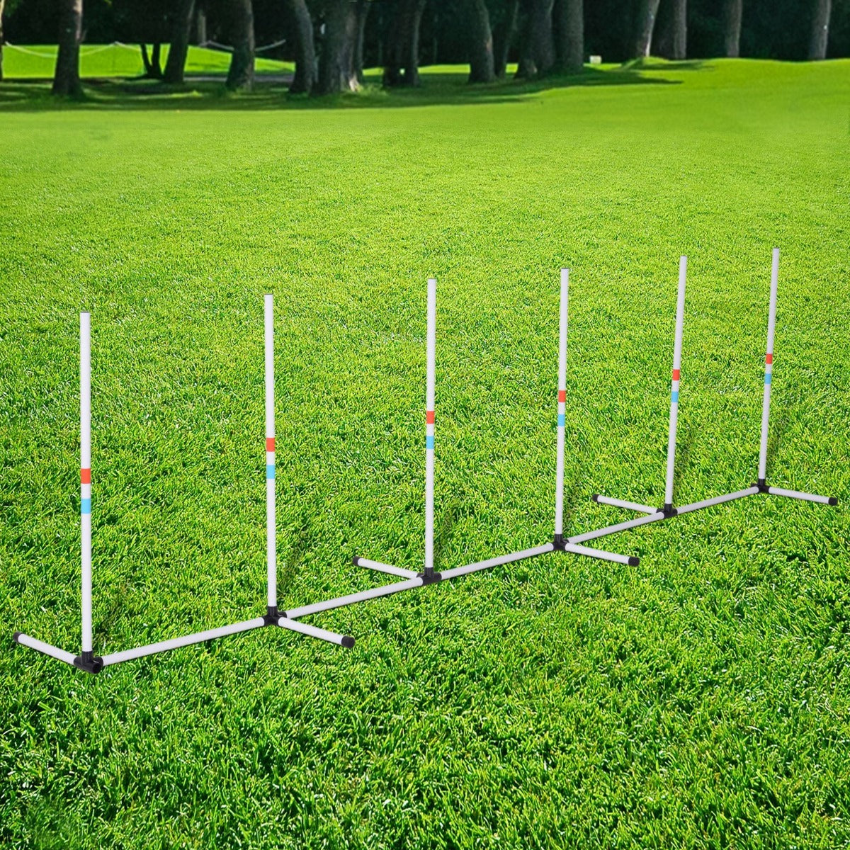 Image of weave polls set up in the grass