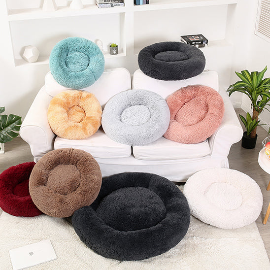 Display of sizes and different colors of Calming Donut Bed For Dogs & Cats