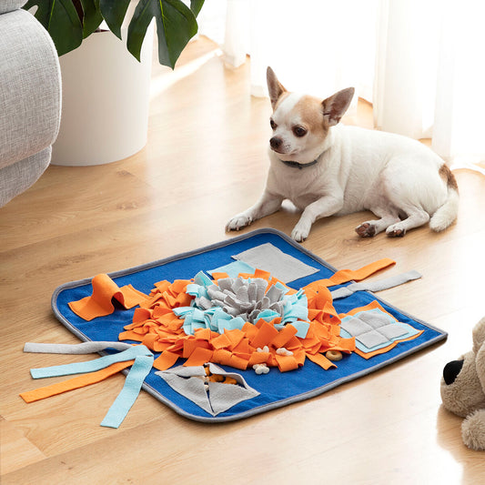 Image of Snuff Mat with a dog laying by mat.